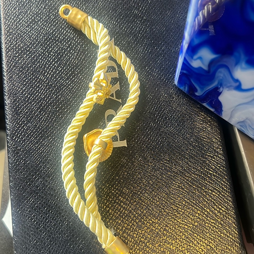 Tory Burch Gold Twisted Rope Bracelet with Logo Charm